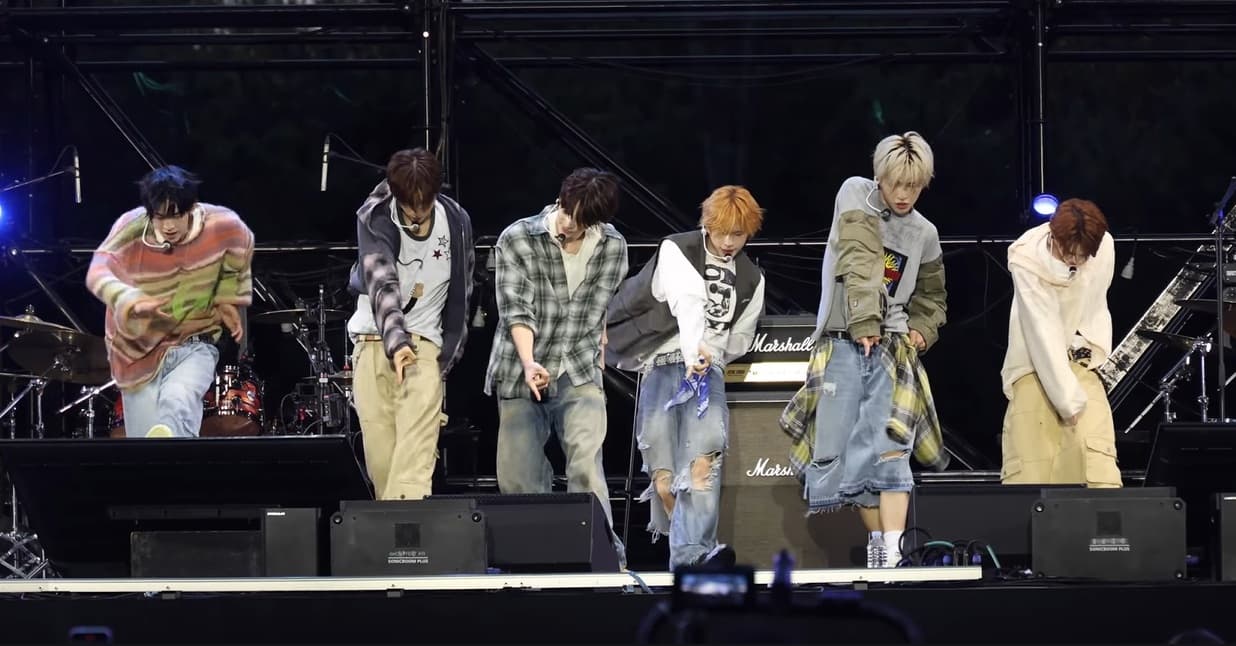 TWS performing on an outdoor festival stage in September 2025